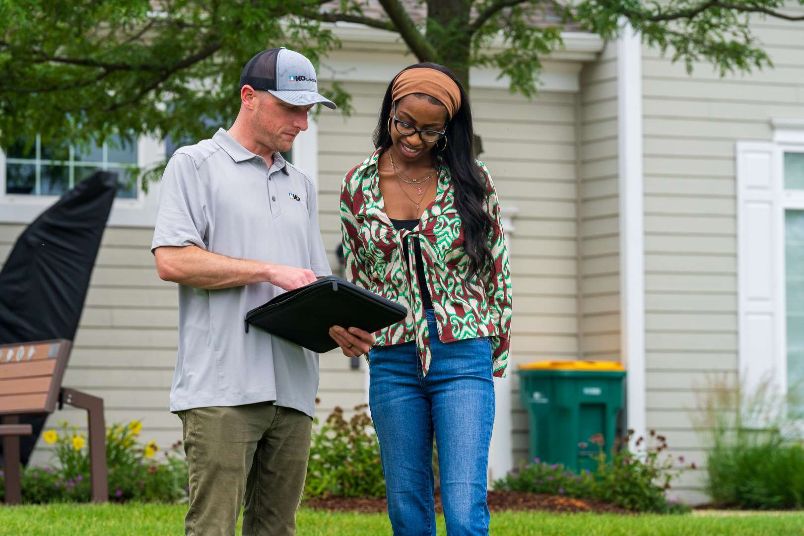 commercial HOA account manager and property manager customer reviewing inspecting a property 20