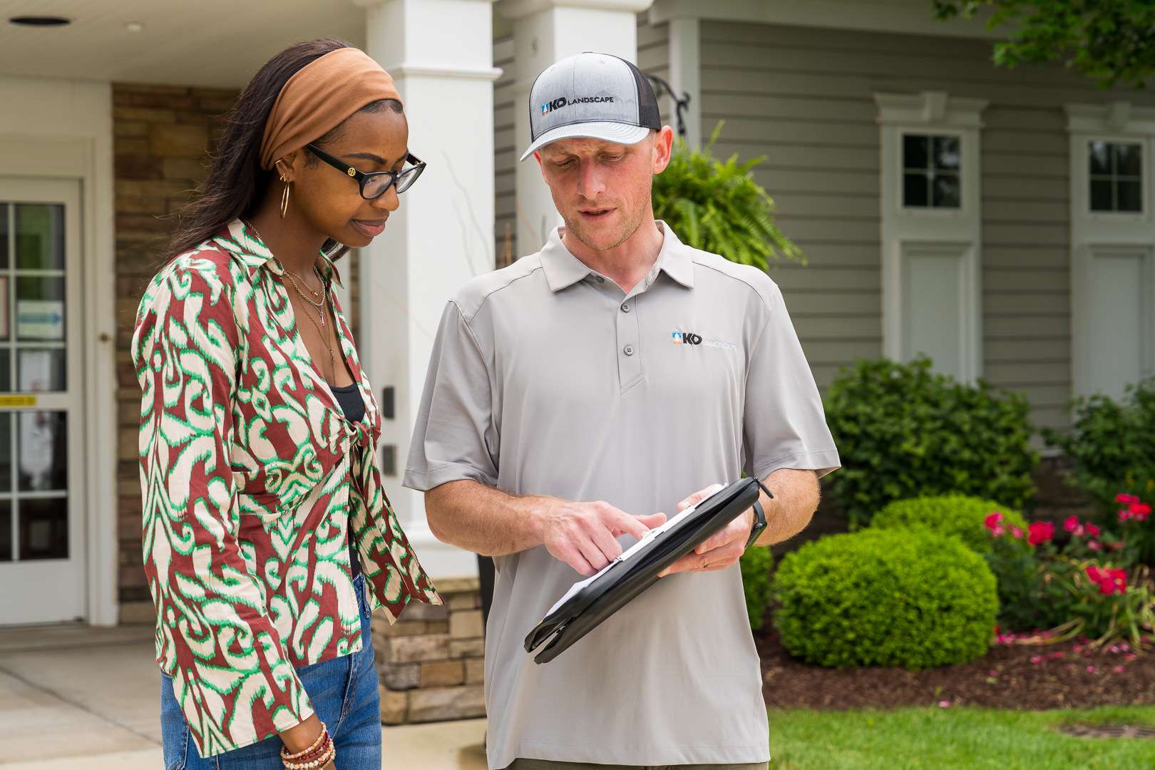 commercial HOA account manager and property manager customer reviewing inspecting a property 32
