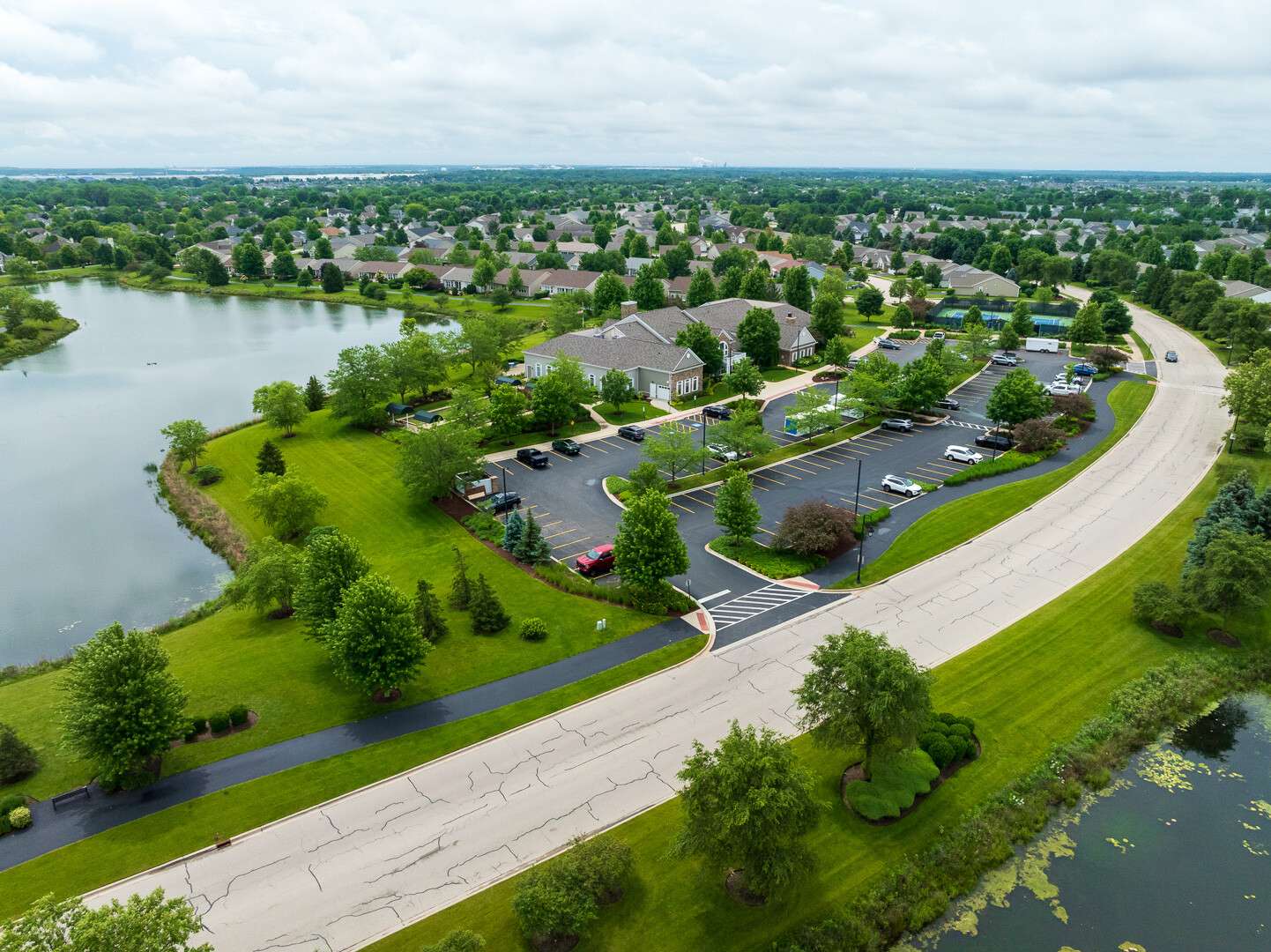 commercial HOA aerial with pond lawns neighborhood 3