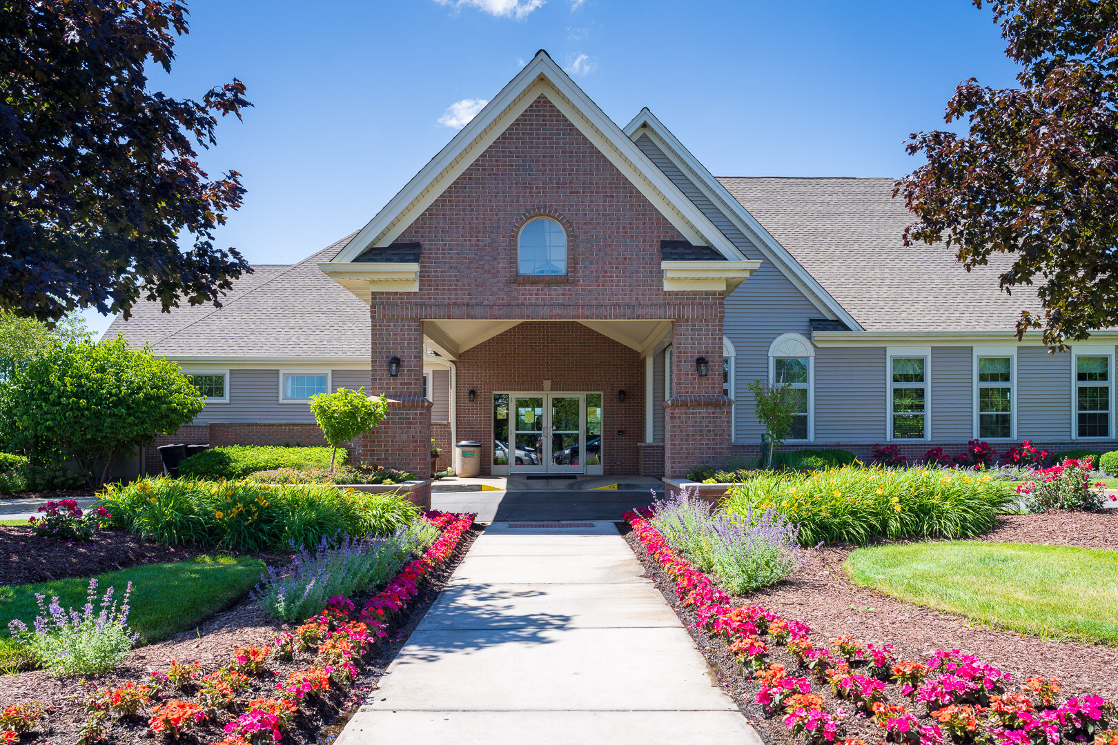 commercial HOA entryway annuals planting walkway