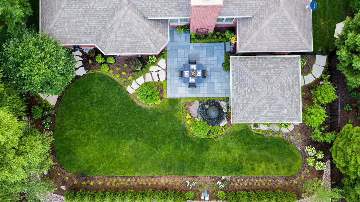 aerial photo of patio with water feature and pavilion 