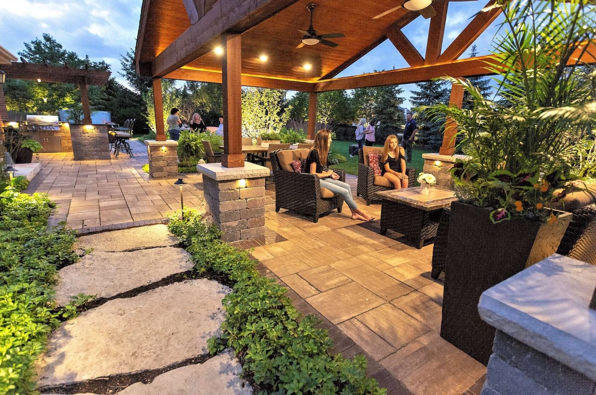landscape lighting with outdoor kitchen and pavilion