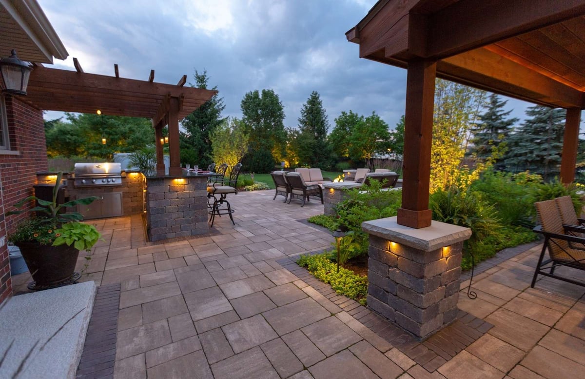 pergola vs pavilion with outdoor kitchen bar and fire pit