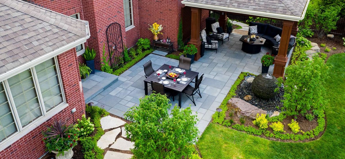 patio with eating area and pavilion