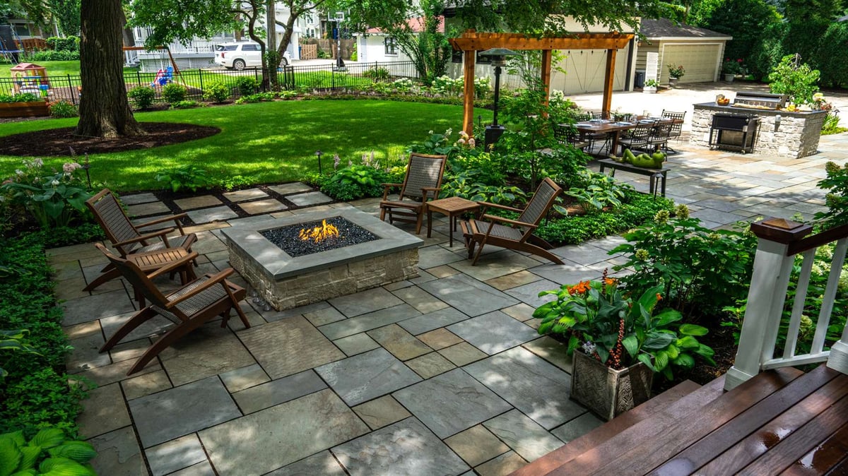patio with firepit seating and pergola