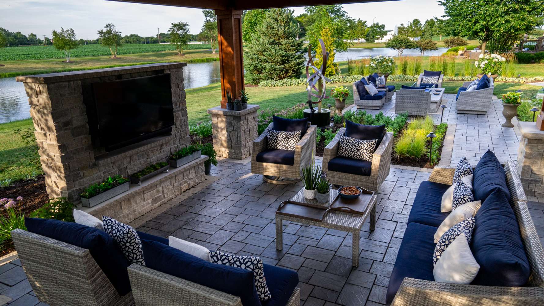 Pavilion seating with a television and lake view