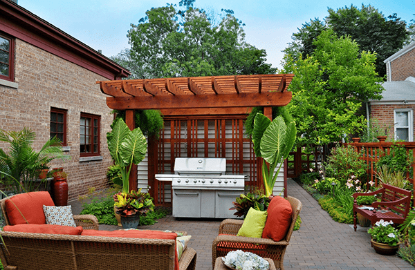 Pergola over an outdoor patio and grill