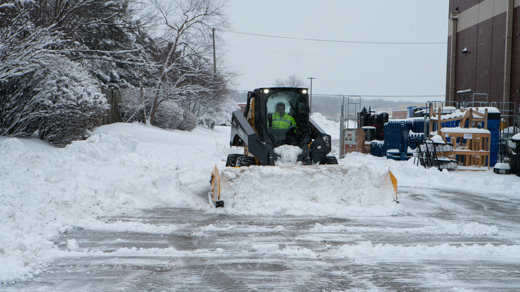 Commercial Snow Removal skidsteer plow warehouse