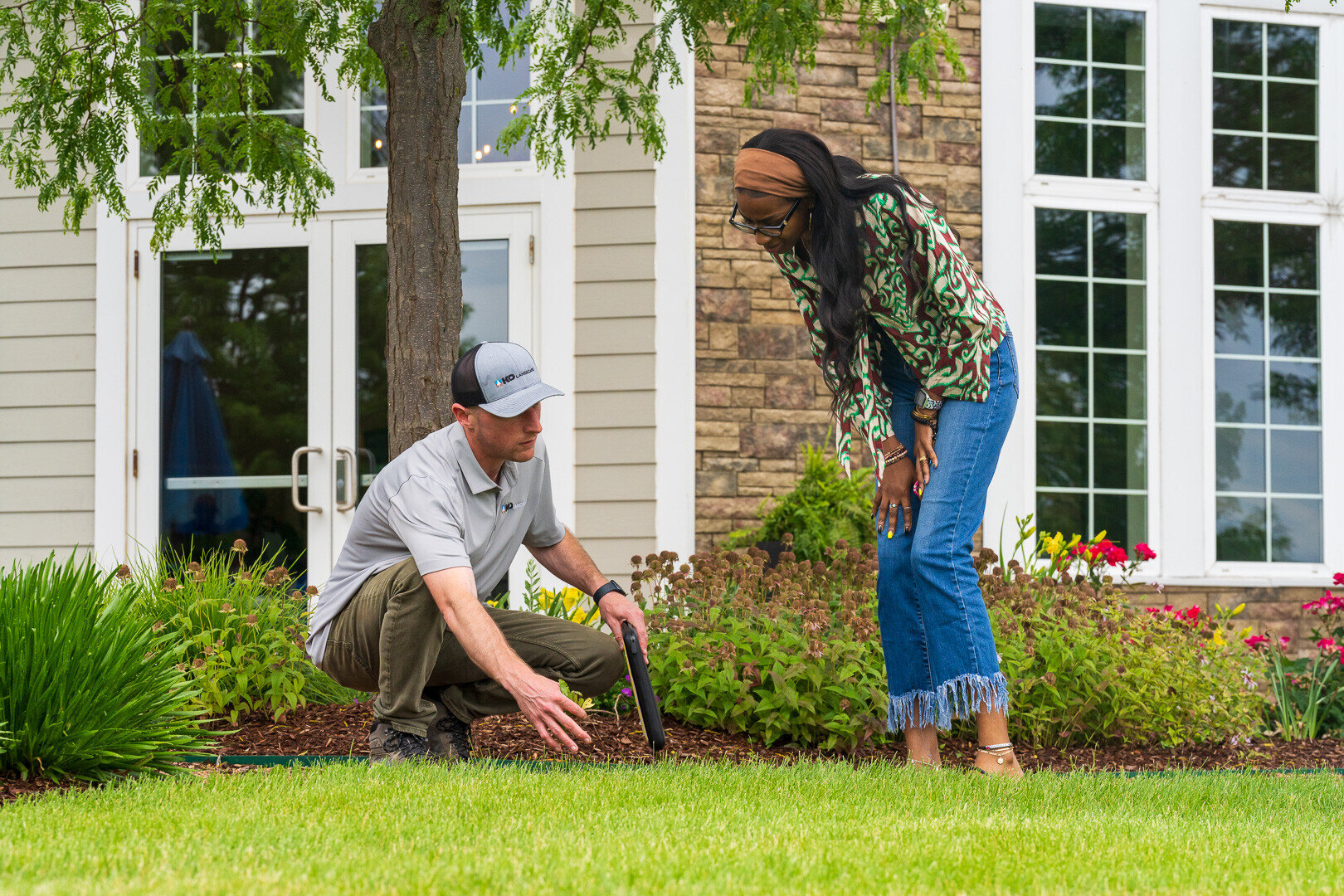 commercial HOA account manager and property manager customer reviewing inspecting a property 12