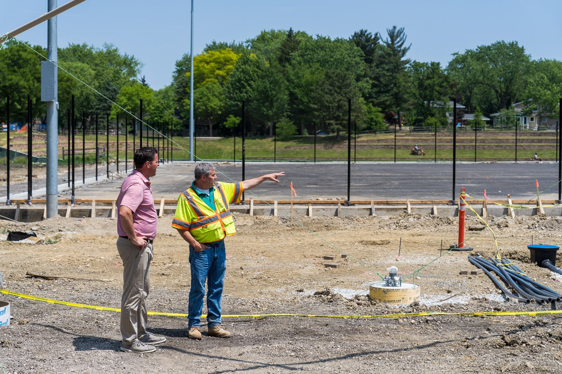 property manager and landscape consultant reviewing a commercial landscaping installation