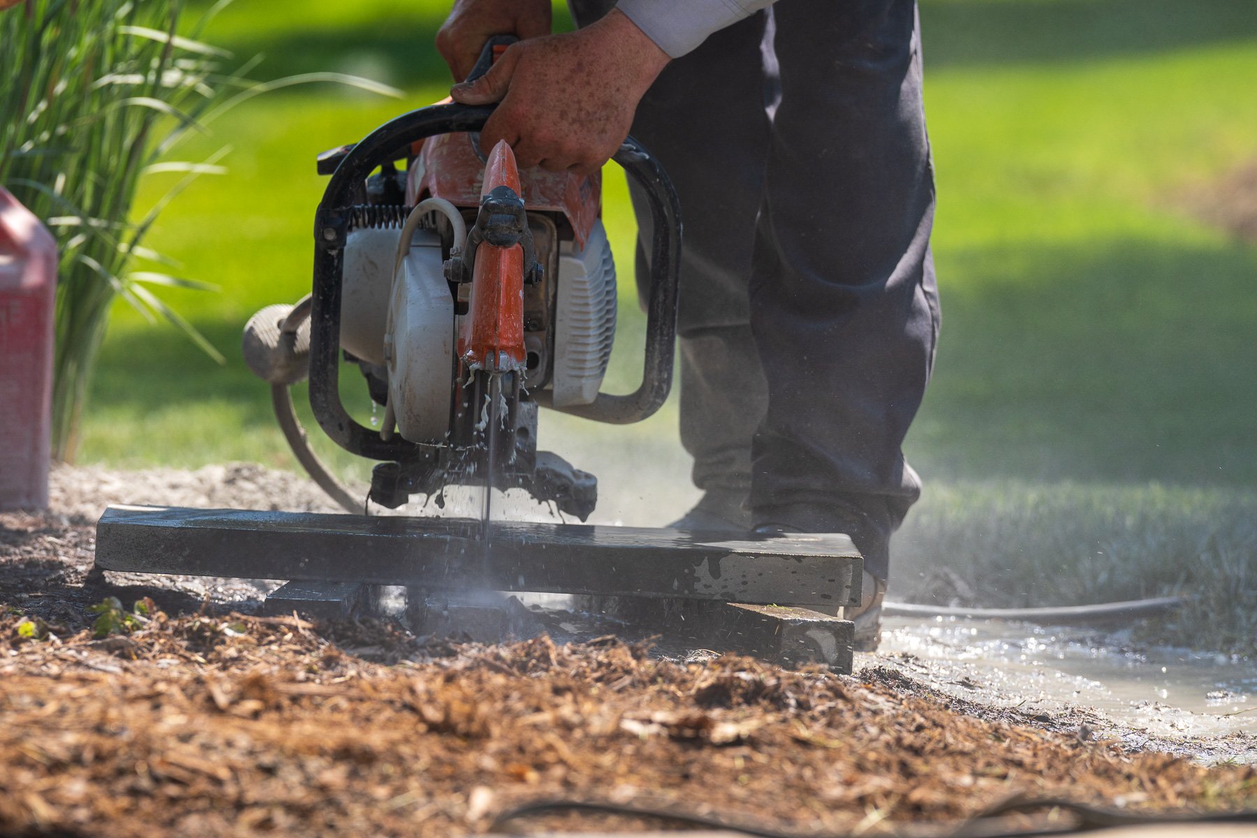 landscape construction technicians hardscape cutting pavers 3