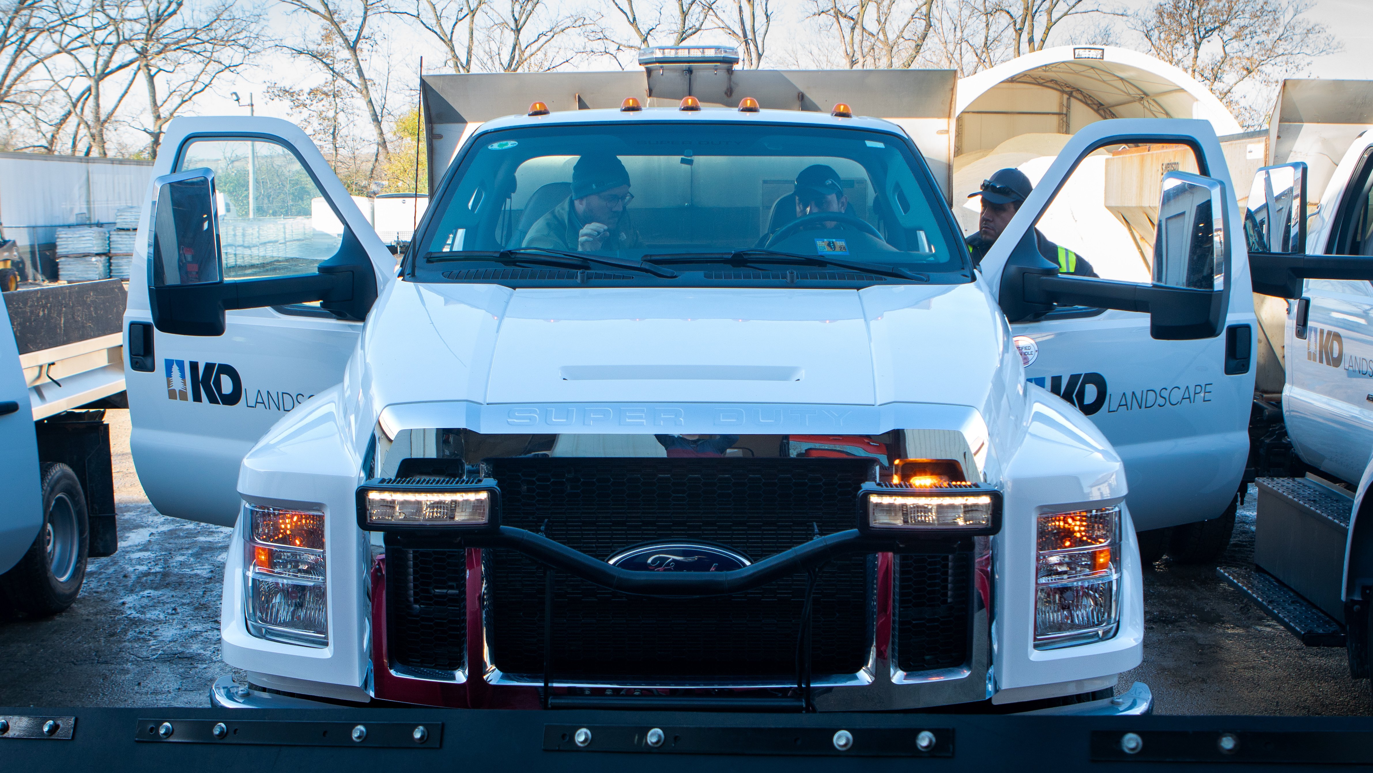 snow removal trucks plows office equipment readiness loading 4