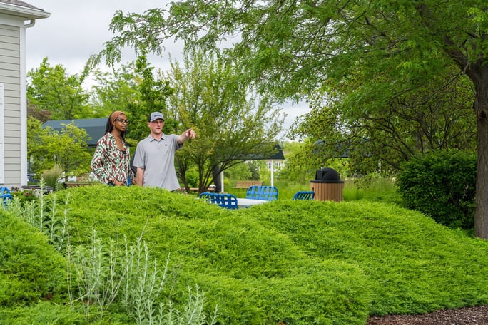 kdlandscapeinc.comhubfschub_backupcommercial HOA account manager and property manager customer reviewing inspecting a property 49